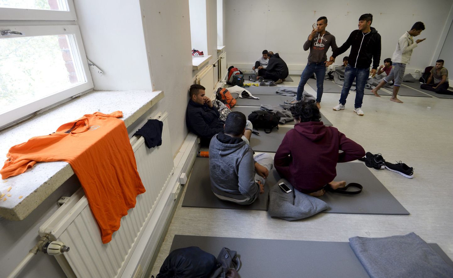 Iraagi migrandid Soomes vastuvõtukeskuses.