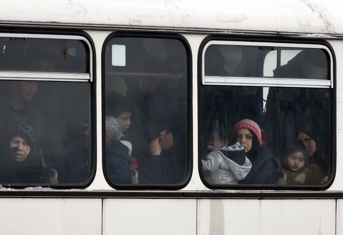 Euroopasse jõudnud migrandid bussis.