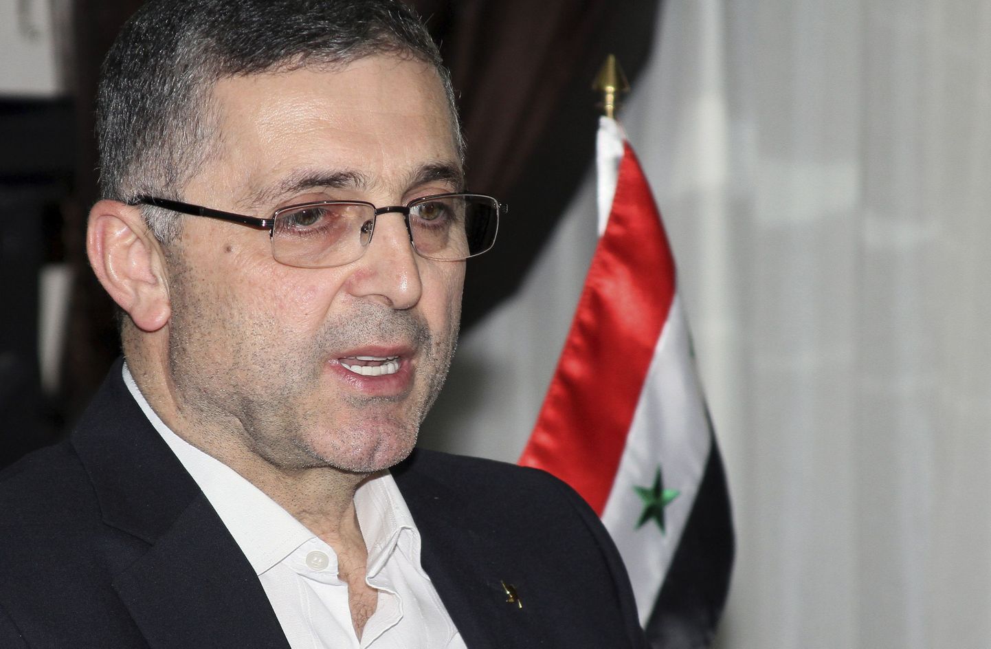 Сирийский министр по вопросам национального примирения Али Хейдар.