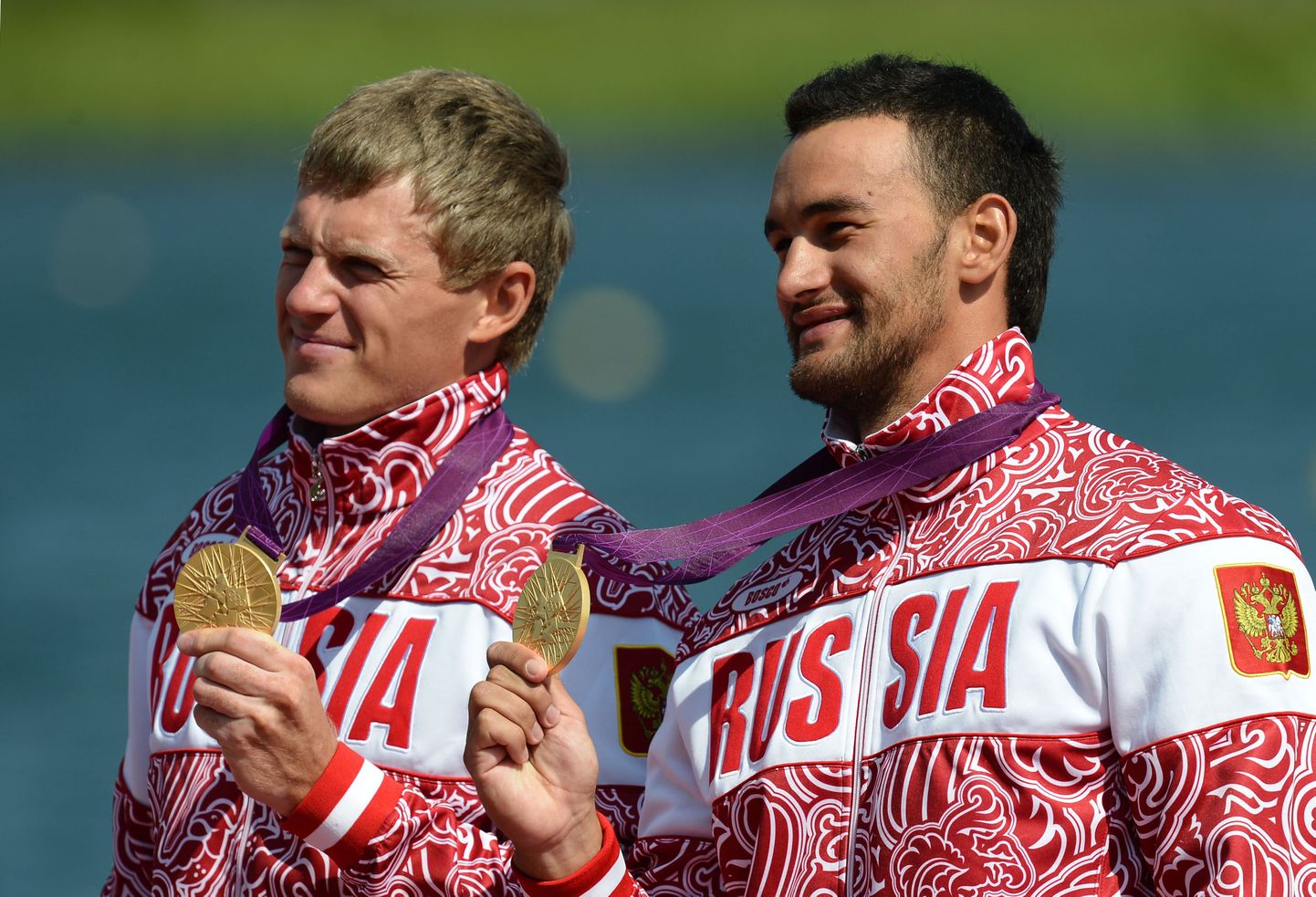 Aleksander Djatšenko koos Juri Postrigaiga pärast Londoni olümpia kullavõitu.