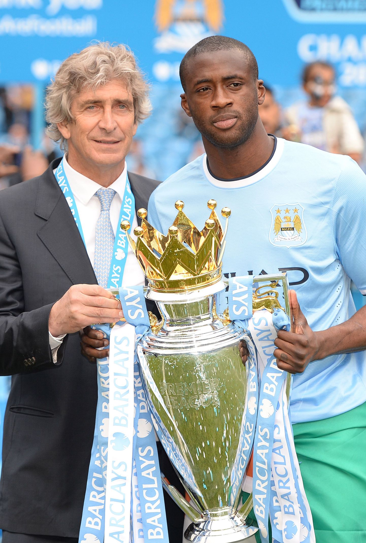 Yaya Toure (paremal) koos Manchester City peatreeneri Manuel Pellegriniga.