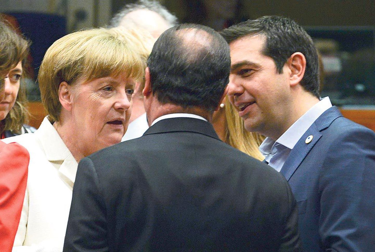 Angela Merkel, Francois Hollande ja Alexis Tsipras Euroopa Liidu riigipeade ja valitsusjuhtide tippkohtumisel Brüsselis.Kreekal pole võlgadest pääsu.