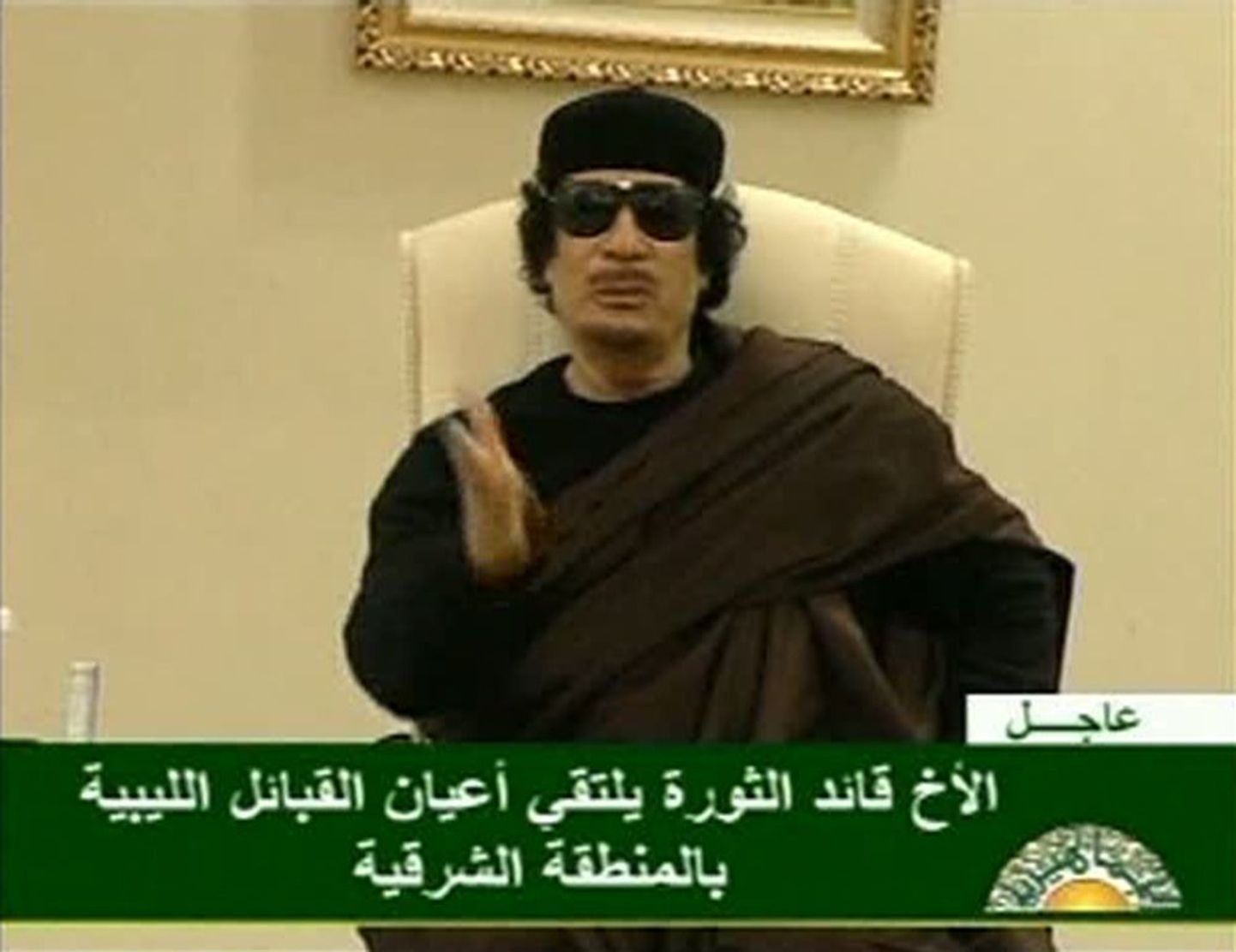 Муамар Каддафи в телеэфире (архив).