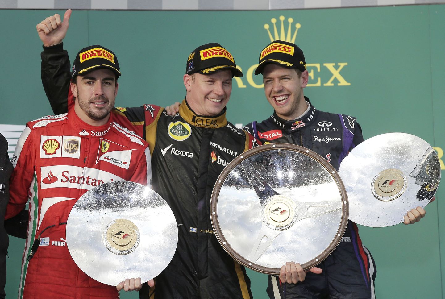 Fernando Alonso (vasakult), Kimi Räikkönen ja Sebastian Vettel. Uuel hooajal sõidab neist kolmest mehest kaks Ferraris, kuid kes?
