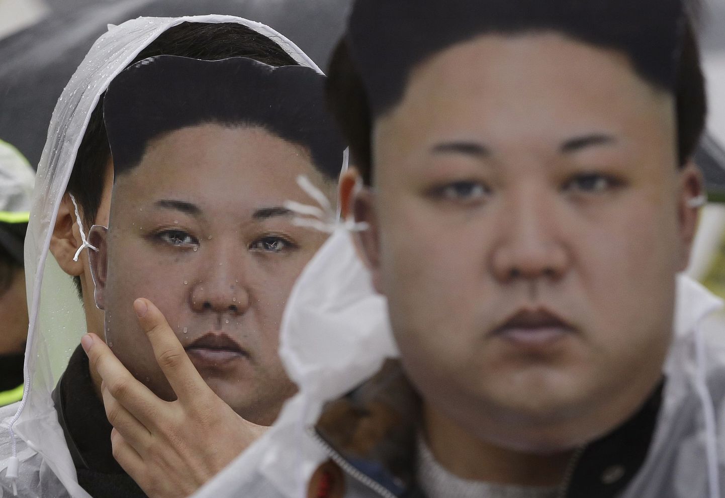 Kim Jong-uni maskides meeleavaldajad Lõuna-Koreas.