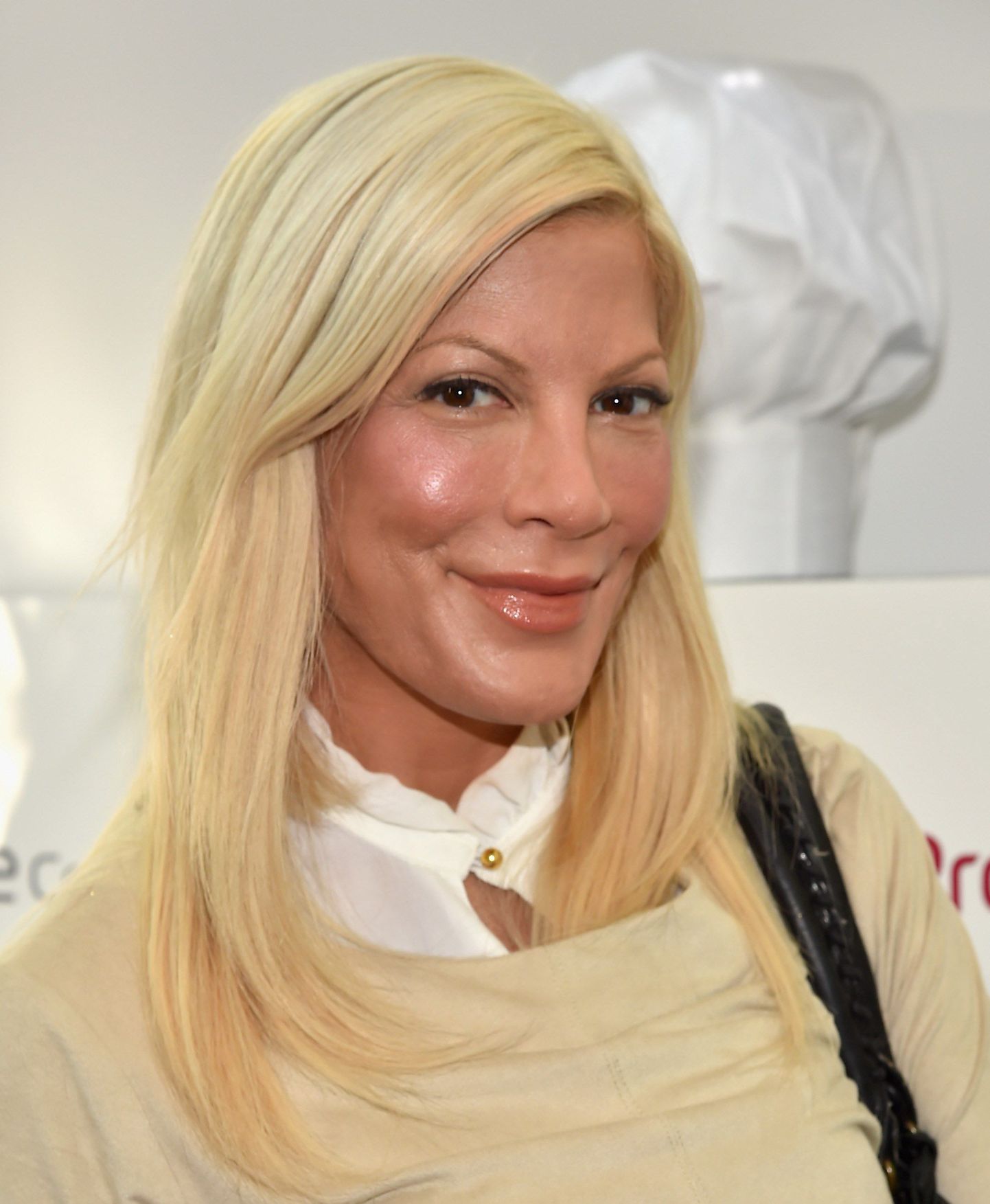 CULVER CITY, CA - AUGUST 22: Actress Tori Spelling attends Eva Longoria and LG Electronics Host "Fam To Table" Series at The Washbow on August 22, 2015 in Culver City, California.   Alberto E. Rodriguez/Getty Images/AFP
== FOR NEWSPAPERS, INTERNET, TELCOS & TELEVISION USE ONLY ==