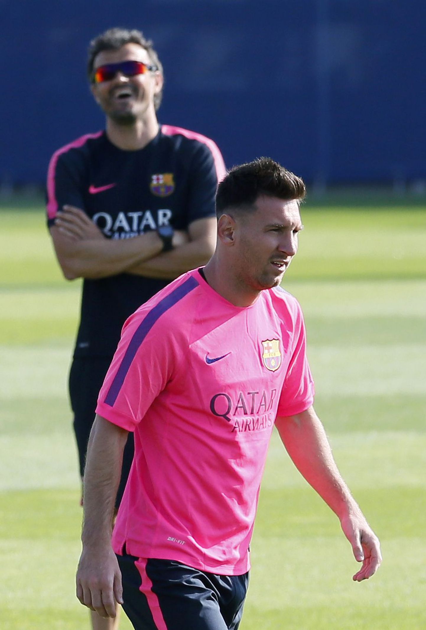 Barcelona peatreener Luis Enrique (taamal) ja Lionel Messi.
