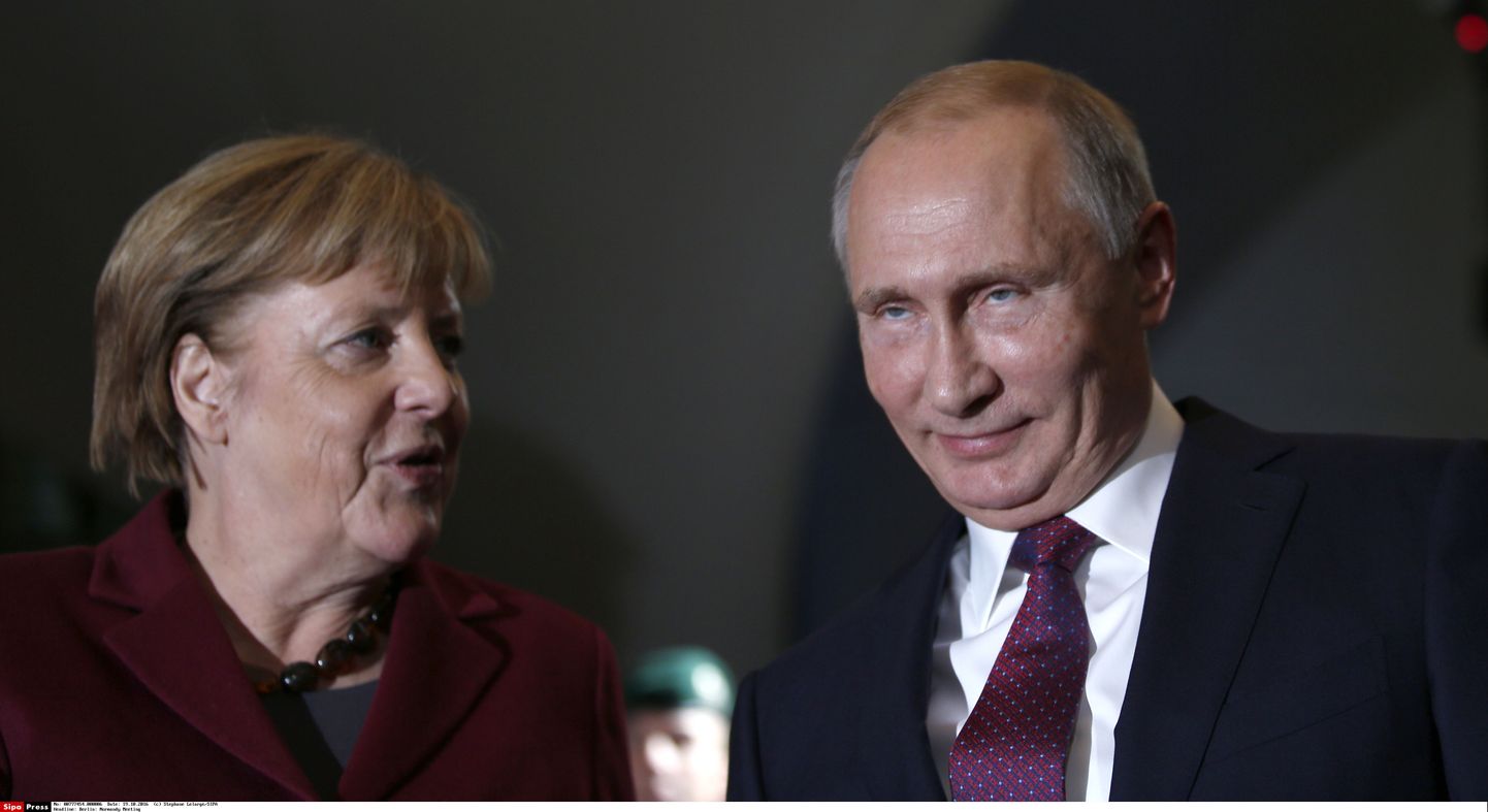 Saksamaa kantsler Angela Merkel ja Venemaa president Vladimir Putin mullu sügisel Berliinis Normandia formaadi kohtumise eel.