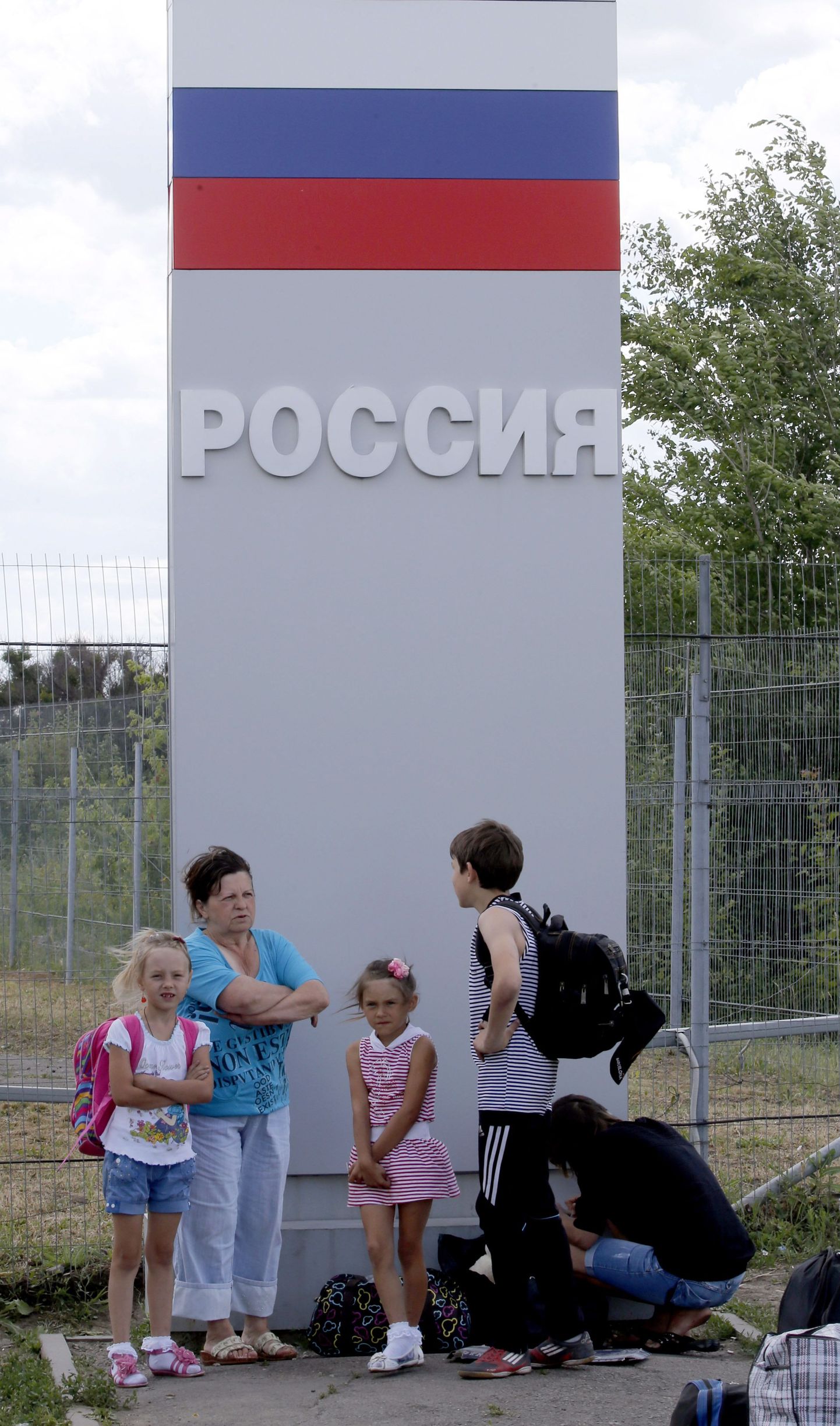 Venemaa kapseldab Ukraina kriisi mõjul oma majandust. Ida-Ukraina põgenikud Venemaa piiripunktis.
