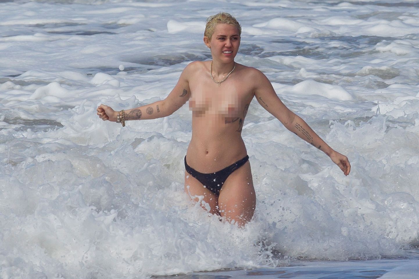Miley Cyrus topless