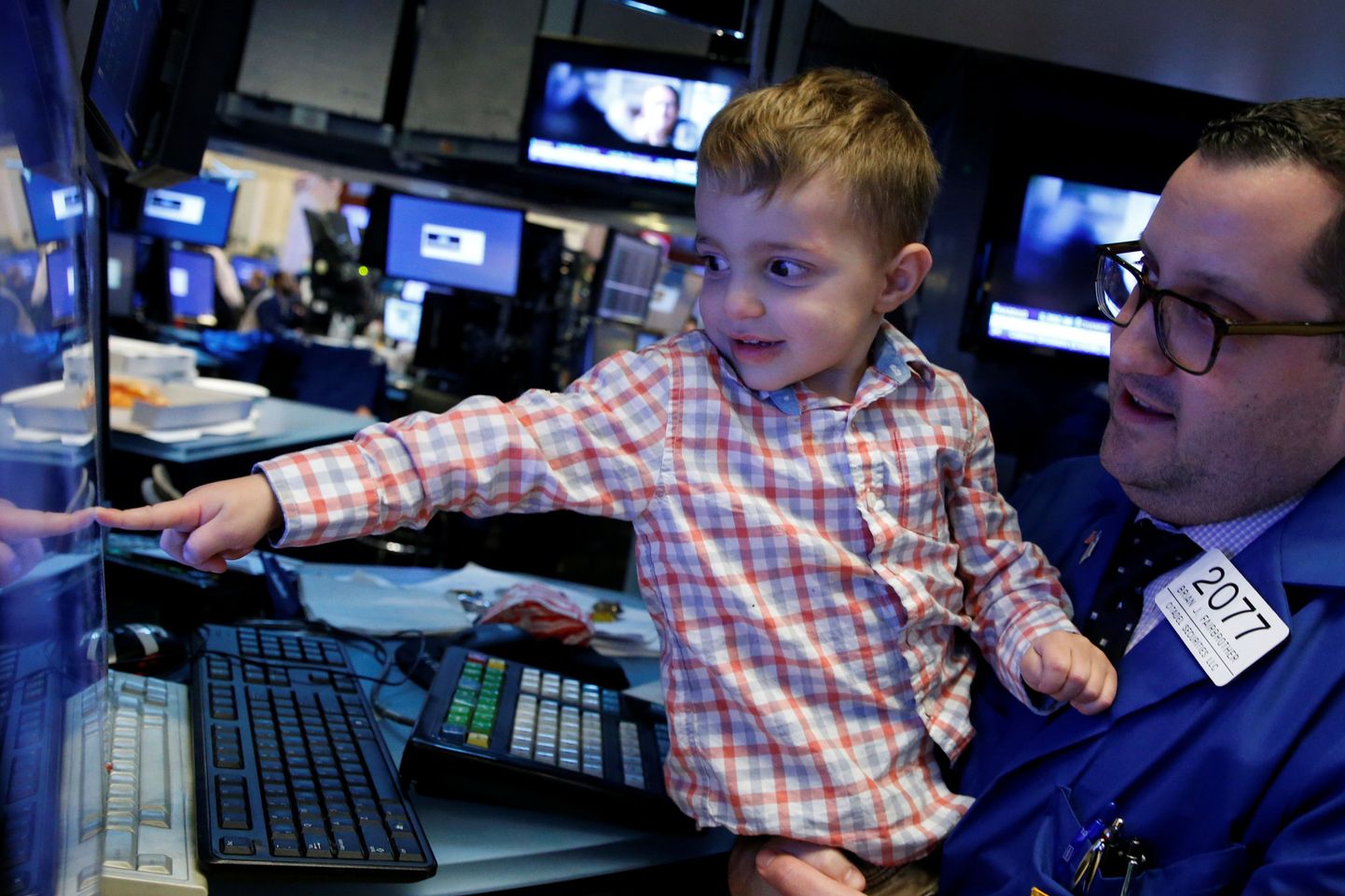 Börsispetsialist Brian Fairbrother koos oma pojaga New Yorgi börsil