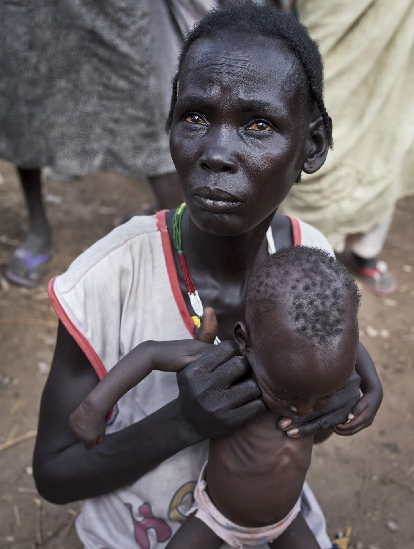 Lõuna-Sudaanis elav Abuk Garang oma seitsmekuuse pojaga.