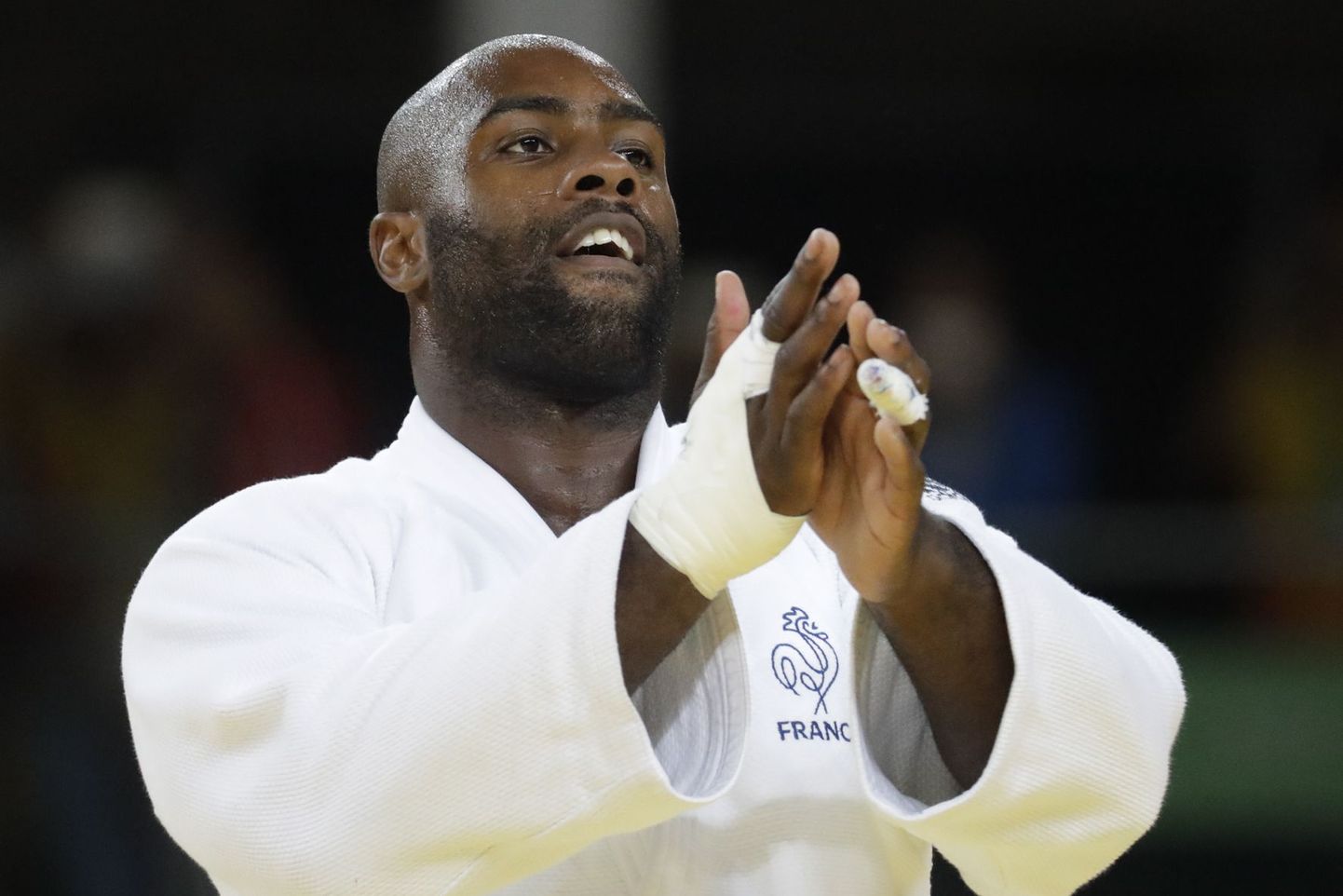 France's Teddy Riner reacts after winning the gold medal during the men's over 100-kg judo competition at the 2016 Summer Olympics in Rio de Janeiro, Brazil, Friday, Aug. 12, 2016. (AP Photo/Markus Schreiber)