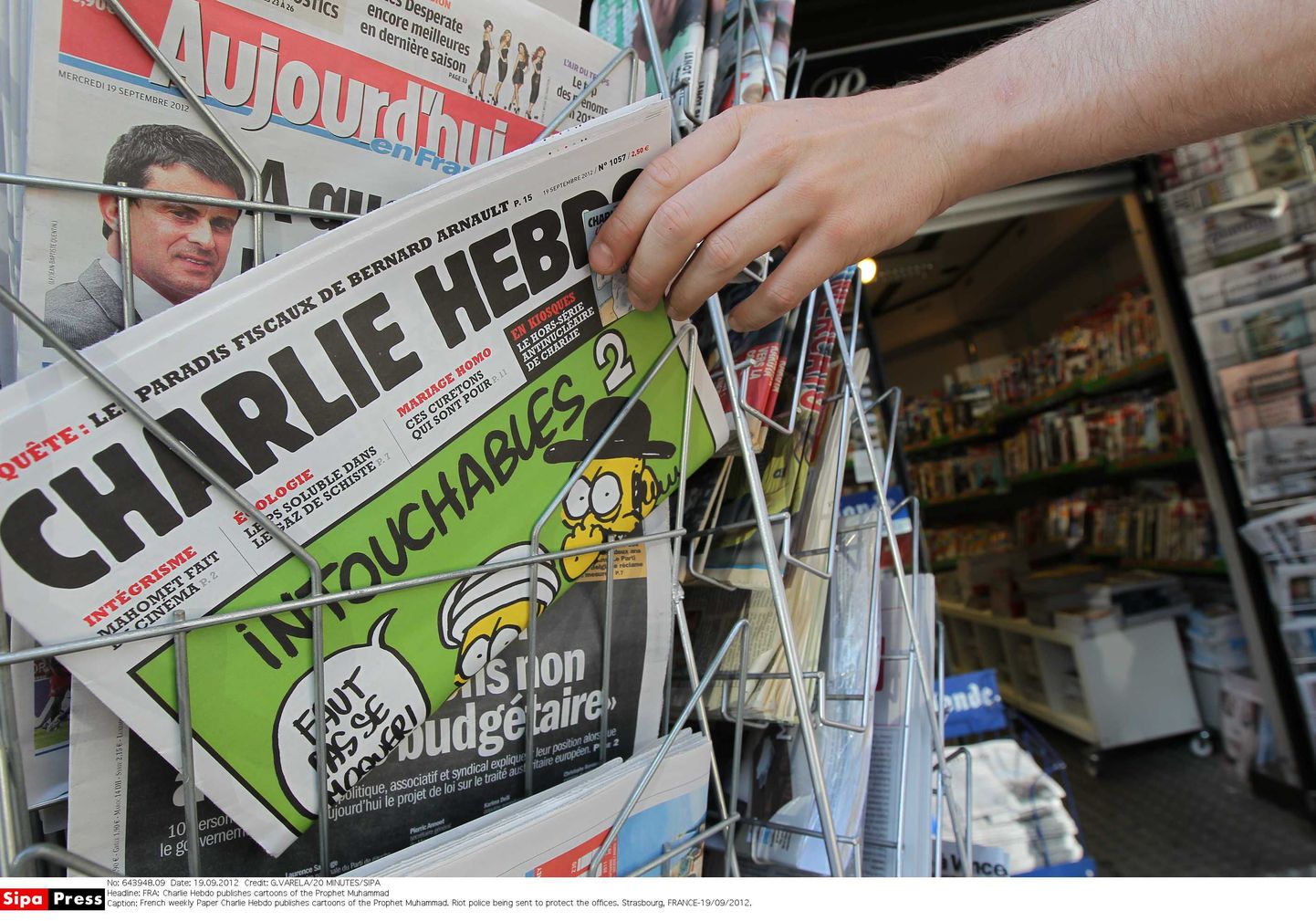 Сатирический журнал Charlie Hebdo.