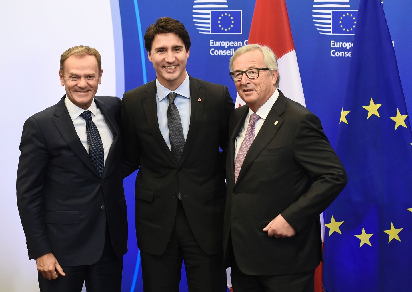 Donald Tusk, Justin Trudeau ja Jean-Claude Juncker.