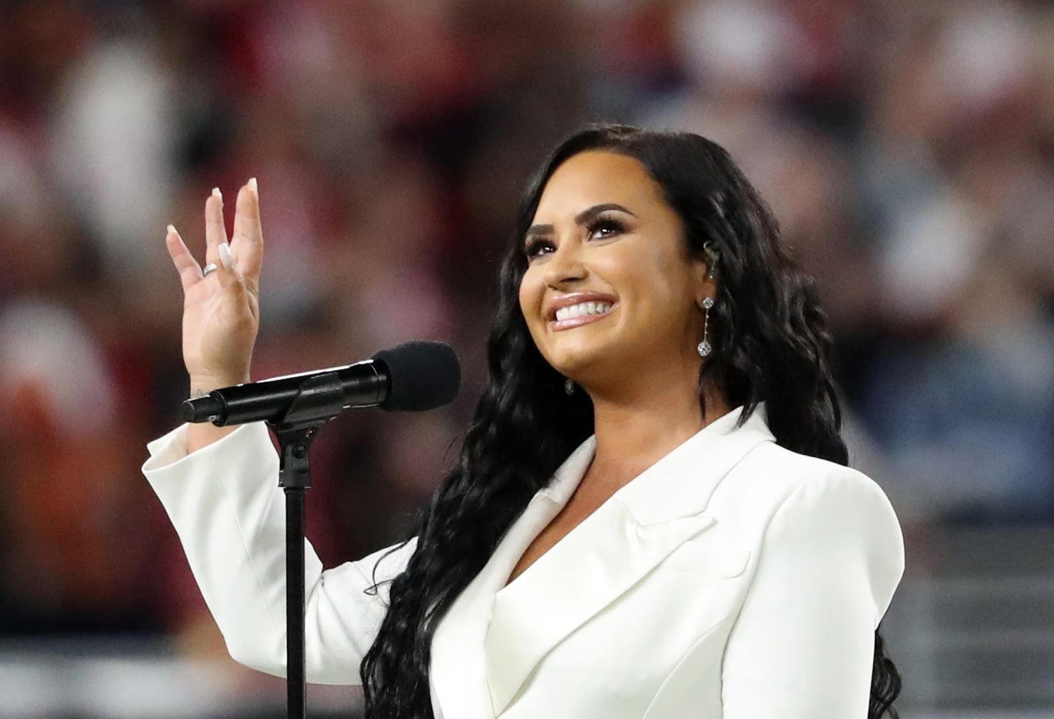 NFL Football - Super Bowl LIV - Kansas City Chiefs v San Francisco 49ers - Hard Rock Stadium, Miami, Florida, U.S. - February 2, 2020 Demi Lovato sings the U.S. national anthem before the game REUTERS/Shannon Stapleton