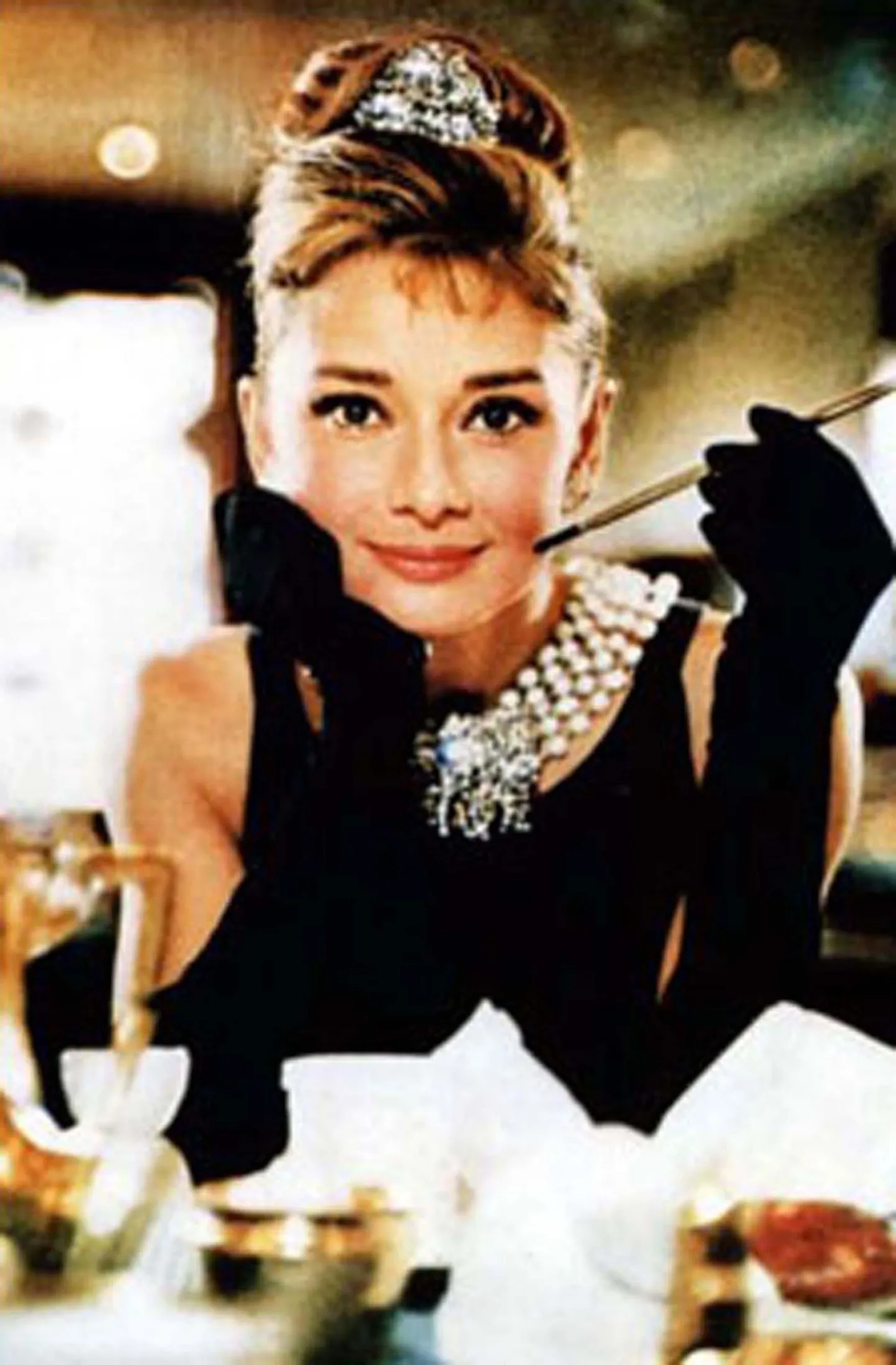 06/12/06

The black Givenchy gown worn by Audrey Hepburn in the film "Breakfast at Tiffany's" sold at auction Tuesday for $807,000.
The price, paid by a telephone bidder, was almost six times the highest pre-sale estimate. The iconic garment had been expected to fetch $98,000 to $138,000 as part of a sale of film and television memorabilia at Christie's auction house in London.
Proceeds from the sale will go to the charity City of Joy Aid, which helps India's poor. Hepburn wore the dress for one of her best-known roles, as eccentric Manhattan socialite Holly Golightly in the 1961 film adaptation of Truman Capote's novel.

Pic supplied: PLANET PHOTOS

Planet Photos Contact Number: 0208 883 1438
