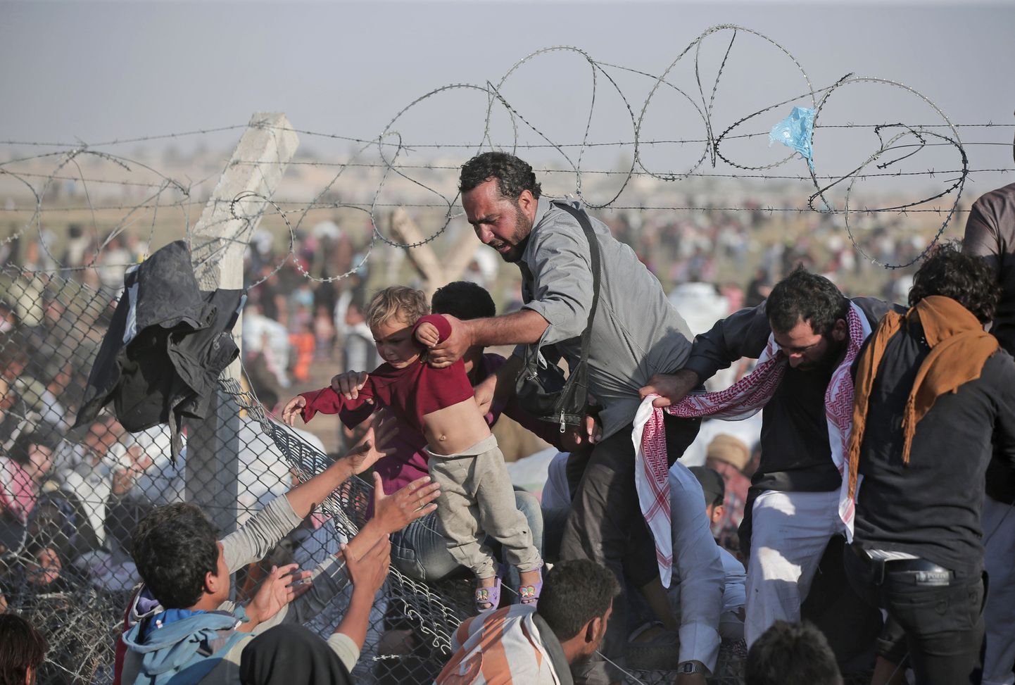 Süüria põgenikud ületavad Türgi piiri.