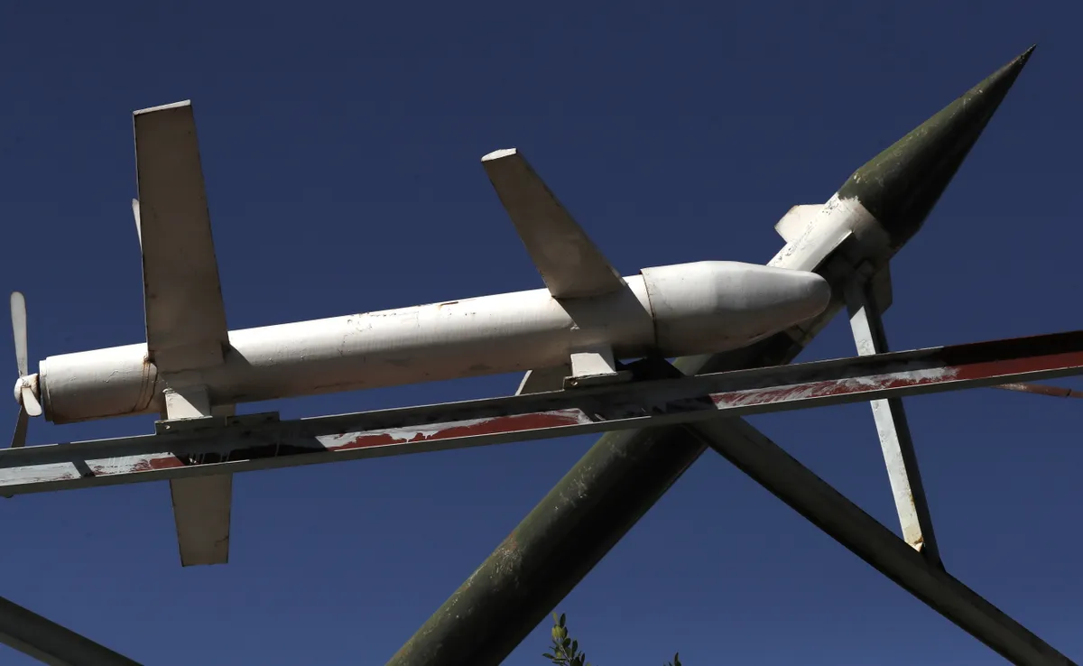 Mock Houthi-made drone and missile are set up at a square in Sana'a, Yemen, December 2023.