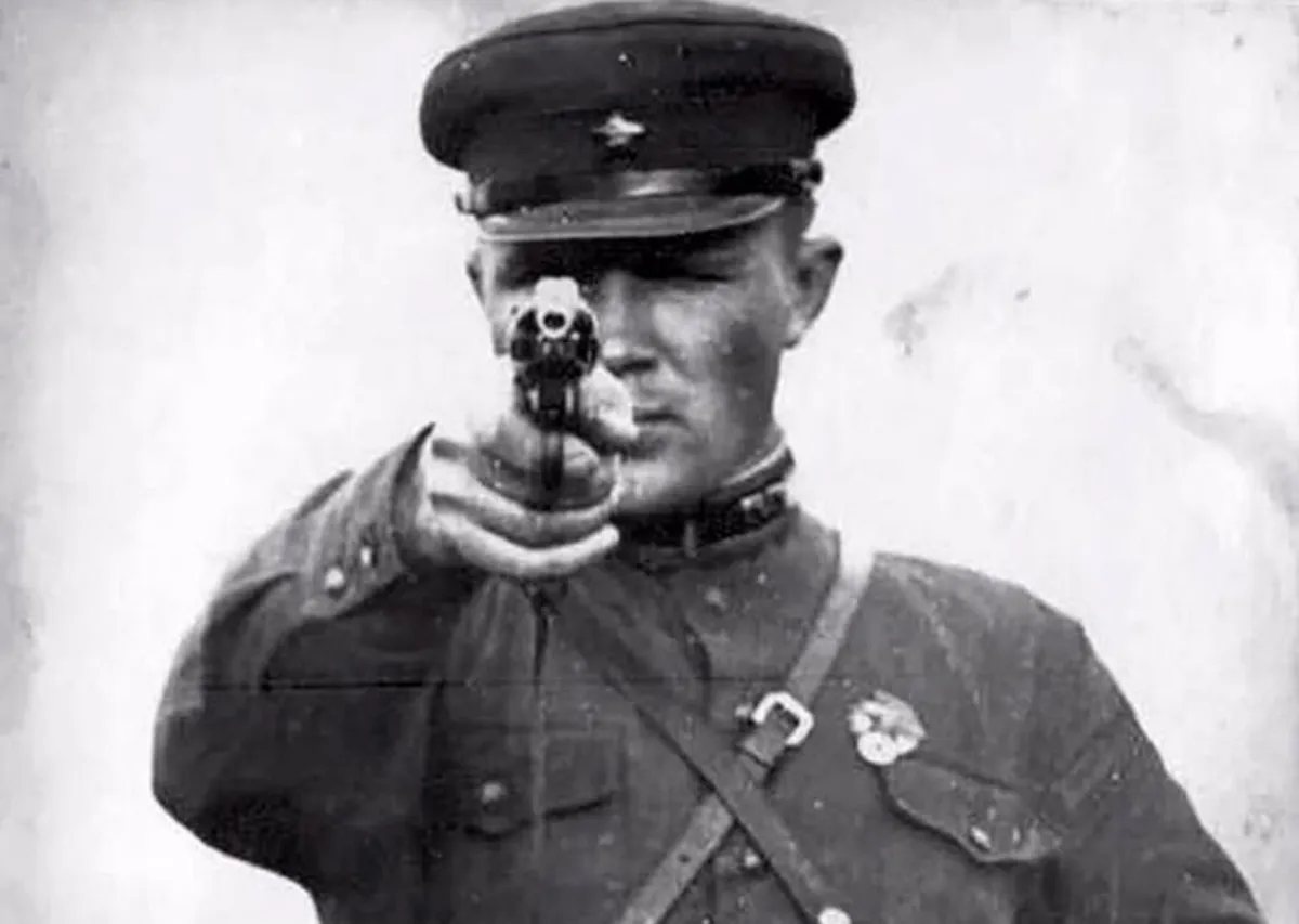 A member of the NKVD (People's Commissariat for Internal Affairs – the main Soviet intelligence service active from 1934–1946, succeeded by today's FSB) execution squad.