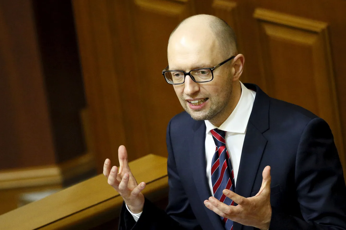 Ukraine's Prime Minister Arseny Yatseniuk delivers a speech during a parliament session in Kiev, Ukraine, February 16, 2016.  REUTERS/Gleb Garanich