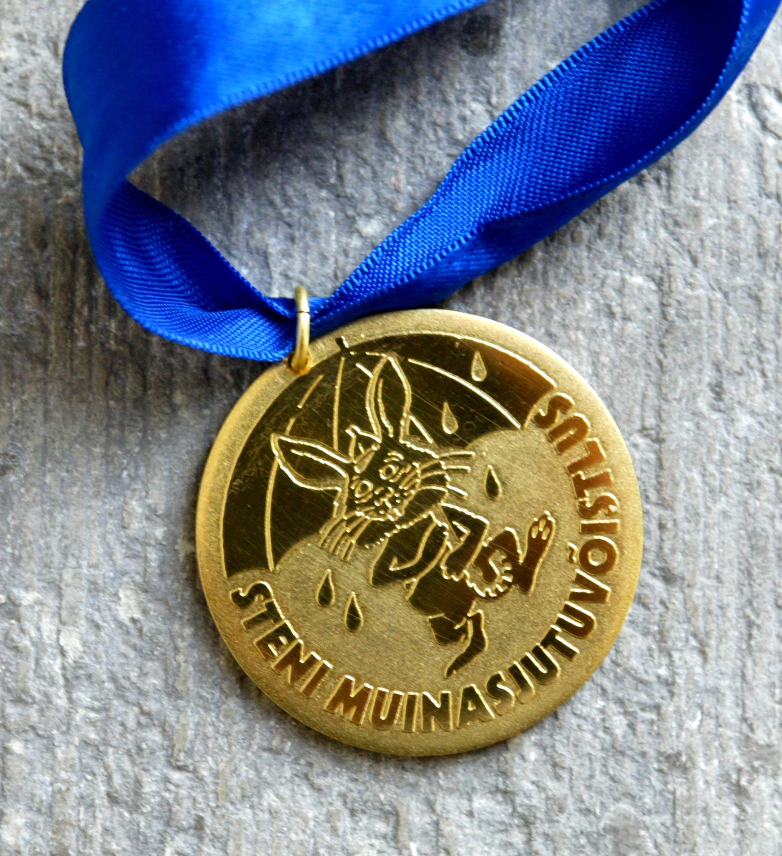 Sten Roosi muinasjutuvõistluse medal.