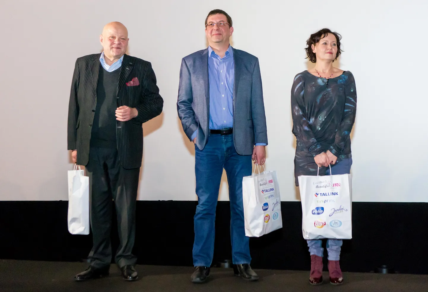 Solaris keskuse Apollo kino, Tallinn. 18.01.2018. 
Uue Eesti filmi "Pilvede all. Neljas õde" esilinastus.
Pildil vasakult AIN LUTSEPP, VLADAS RADVILAVICIUS, KARIN TAMMARU.
Foto: Madis Sinivee