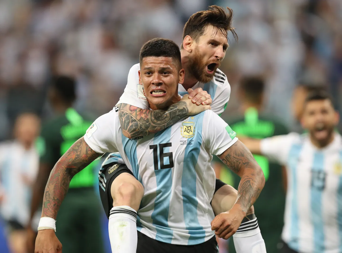 Lionel Messi ja Marcos Rojo tähistavad Argentina võiduväravat,mis tõi Argentinale ka alagrupist edasipääsu