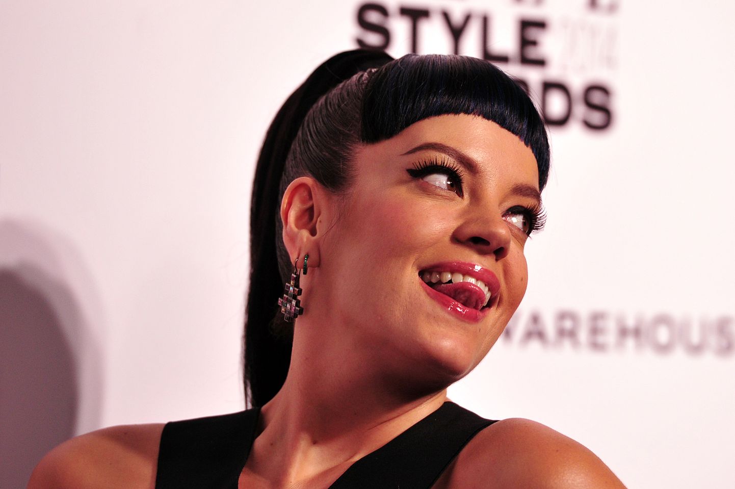 British singer Lily Allen attends the Elle Style Awards in central London, on February 18, 2014. AFP PHOTO/CARL COURT