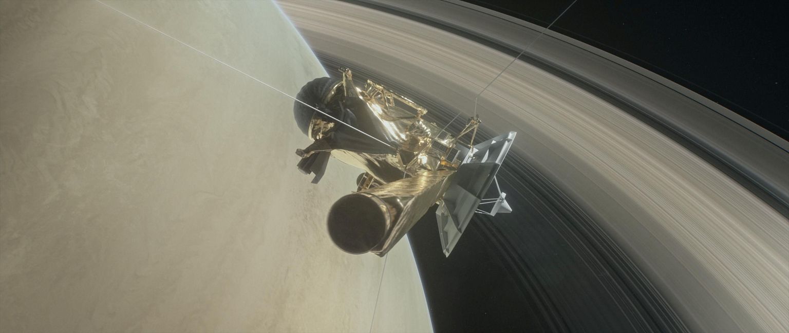 Kunstniku nägemus Cassini-Huygensi uurimisalusest Saturni rõngaste taustal.
