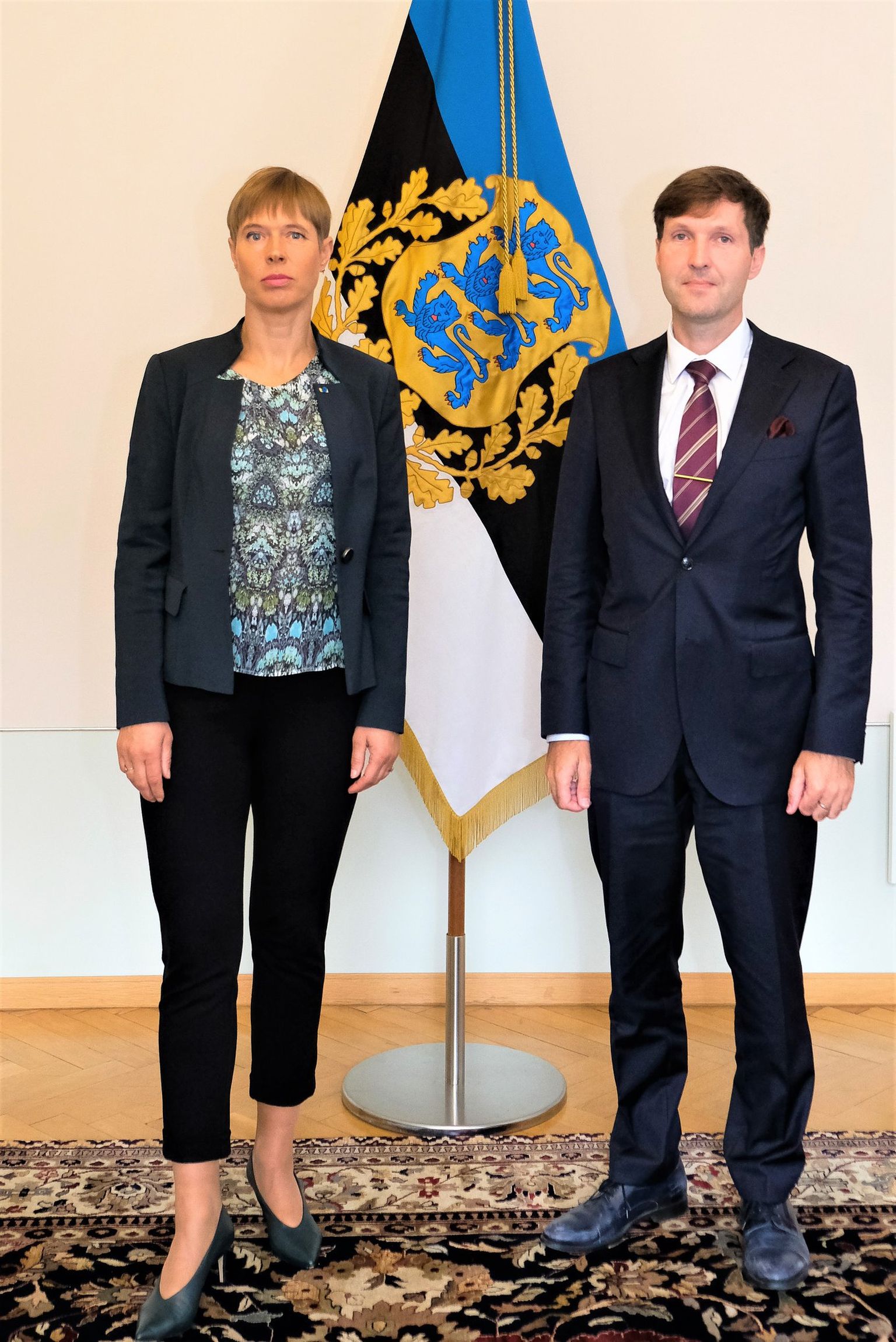 Президент Керсти Кальюлай и министр финансов Мартин Хельме после встречи.