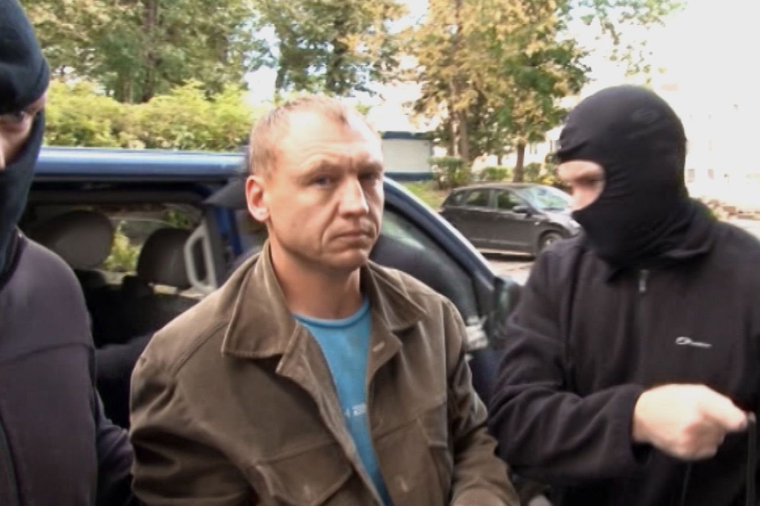 2491507 09/11/2014 Employee of the Tartu Department of Estonian Security Police (KAPO) Eston Kohver (center) detained in the Pskov Region near the building of Moscow's Lefortovo Court. (Maximum quality)./Public relations center of Feder