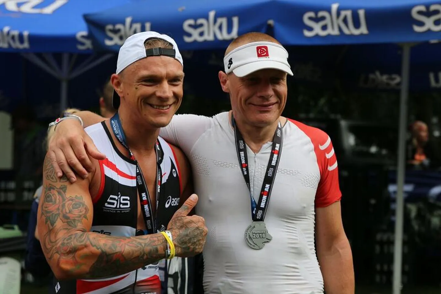 Margus Lepik ja Tanel Padar SiS IRONMAN 70.3 Otepää presented by Ferroline Group triatloni finišis 6. augustil 2016.