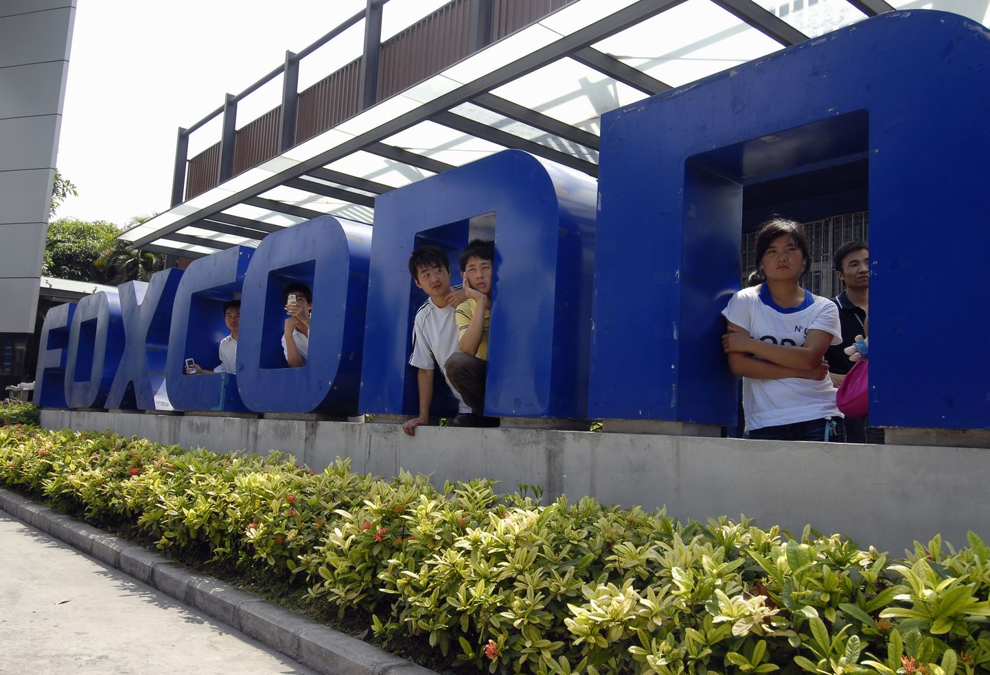 Foxconni töölised Hiinas Guangdongi provintsis Shenzhenis asuva tehase juures.