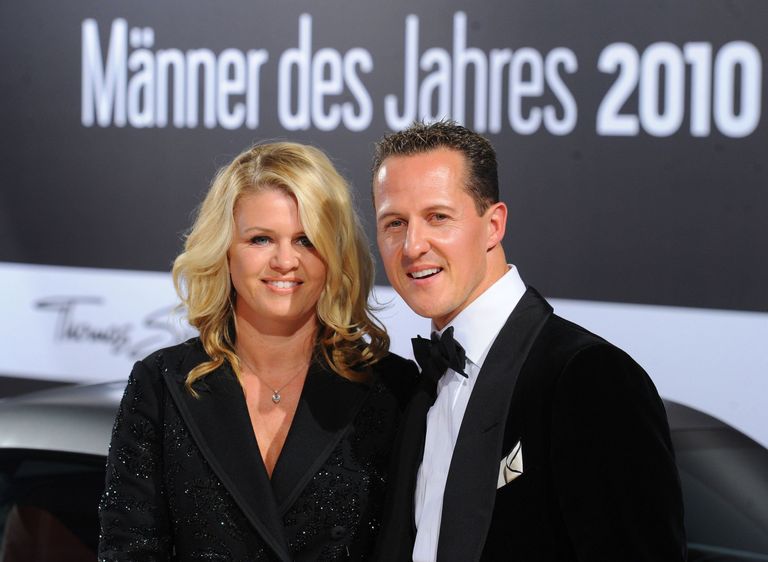 Михаэль Шумахер с супругой (2010 год).
