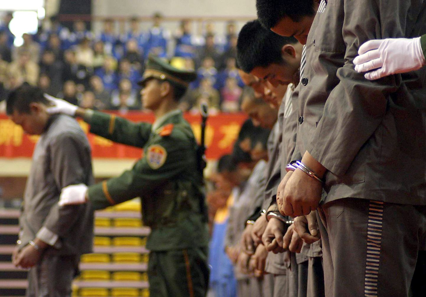Hiina politsei ja vangid. Pilt on illustreeriv