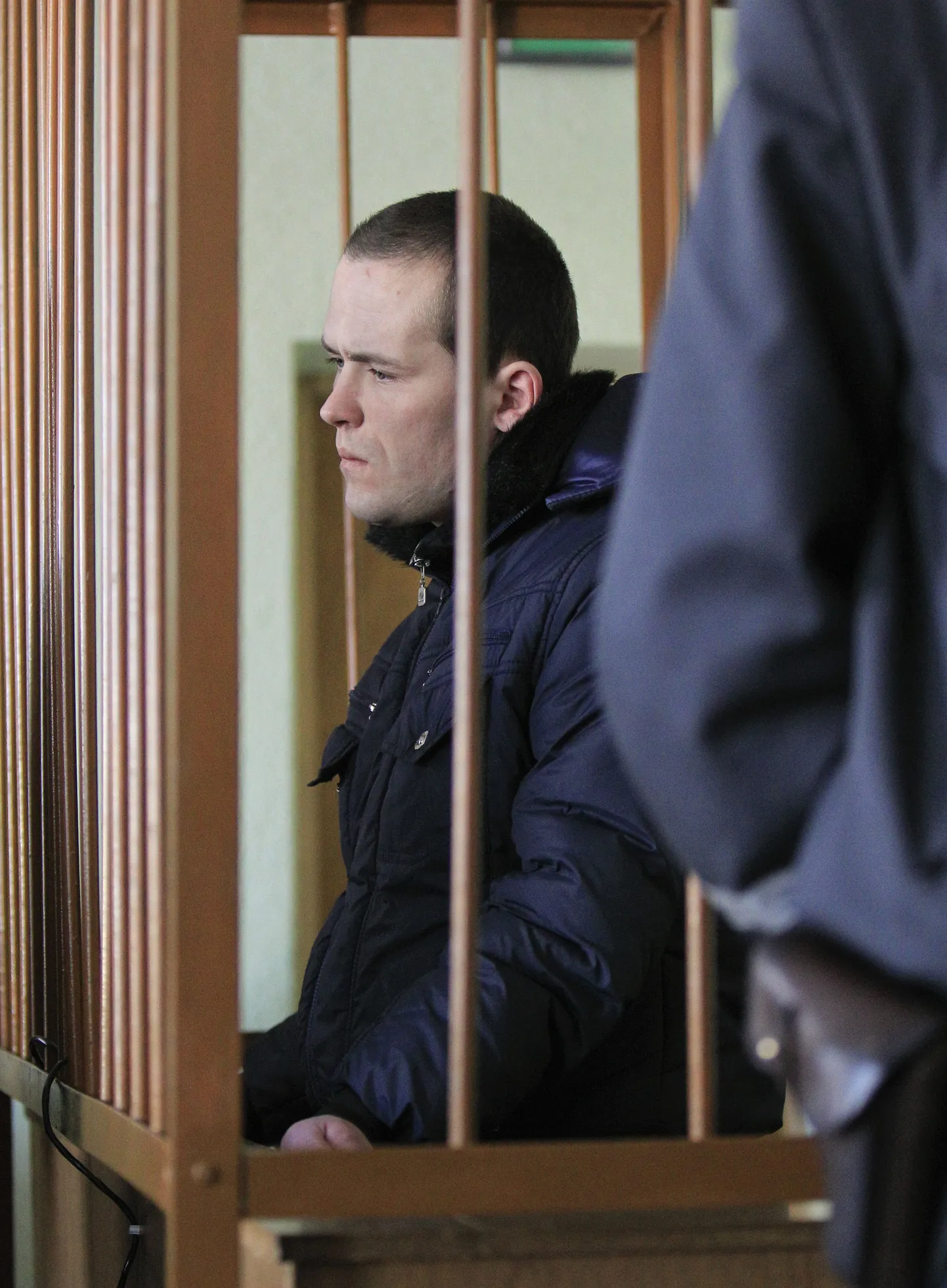 Vassili Parfenkov Minski kohtusaalis veebruaris 2011.
