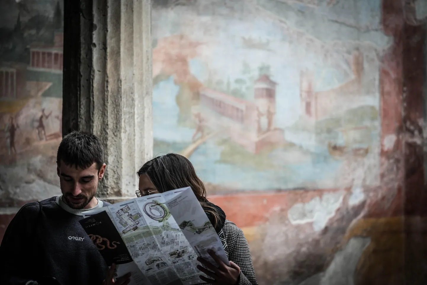 epa11732841 People visit the House of the Little Fountain (the Casa della Fontana Piccola) after it was reopened to the public following restoration, Pompeii, Italy, 21 November 2024. The site was reopened to the public inaugurating the fourth edition of 'Telling the construction sites'. Every Thursday until 17 April 2025, holders of the MyPompeii Card will be able to visit the construction sites of the archaeological park. The house, known for the mosaic fountain with shells and copies of bronze statues, offers a glimpse into the prestige of its ancient owners. Recent interventions concerned the reinforcement of the roofs, the waterproofing of the attics and the conservation of the decorations of the peristyle.  EPA/CESARE ABBATE