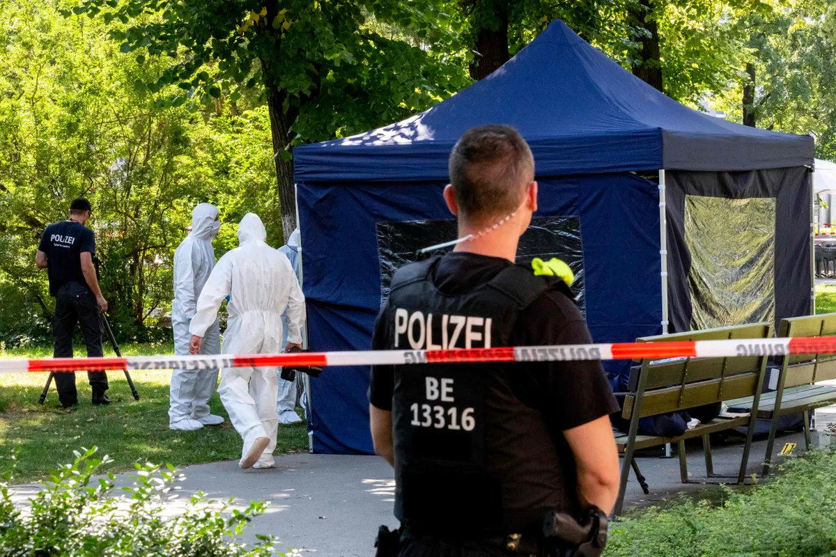 August 23, 2019. Forensic experts of the German police securing evidences at the site of a crime scene in a park of Berlin's Moabit district, where a former Chechen rebel commander, the 40-year-old Georgian national Zelimkhan Khangoshvili was killed by a Russian national in Berlin's Kleiner Tiergarten park.