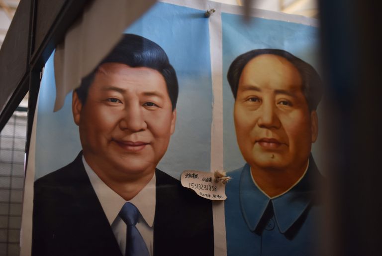 Xi Jinpingi ja Mao Zedongi portreed ühel Pekingis asuval turul. GREG BAKER/AFP/SCANPIX
