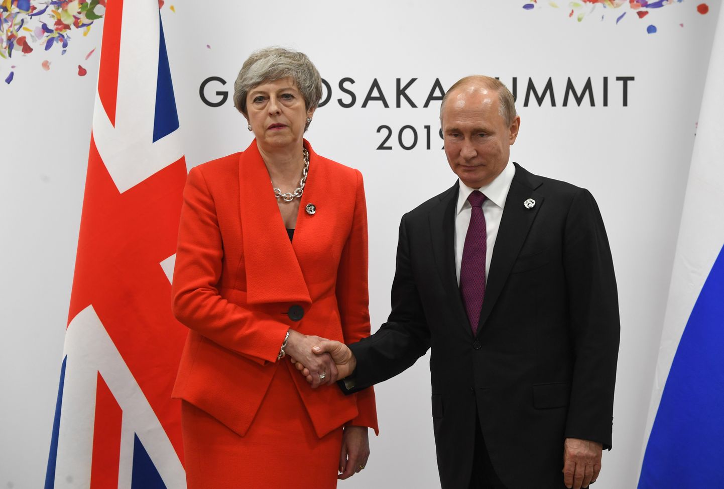 Briti peaminister Theresa May ja Venemaa president Vladimir Putin kätlemas kohtumisel, mis toimus G20 tippkohtumise kõrvalt.