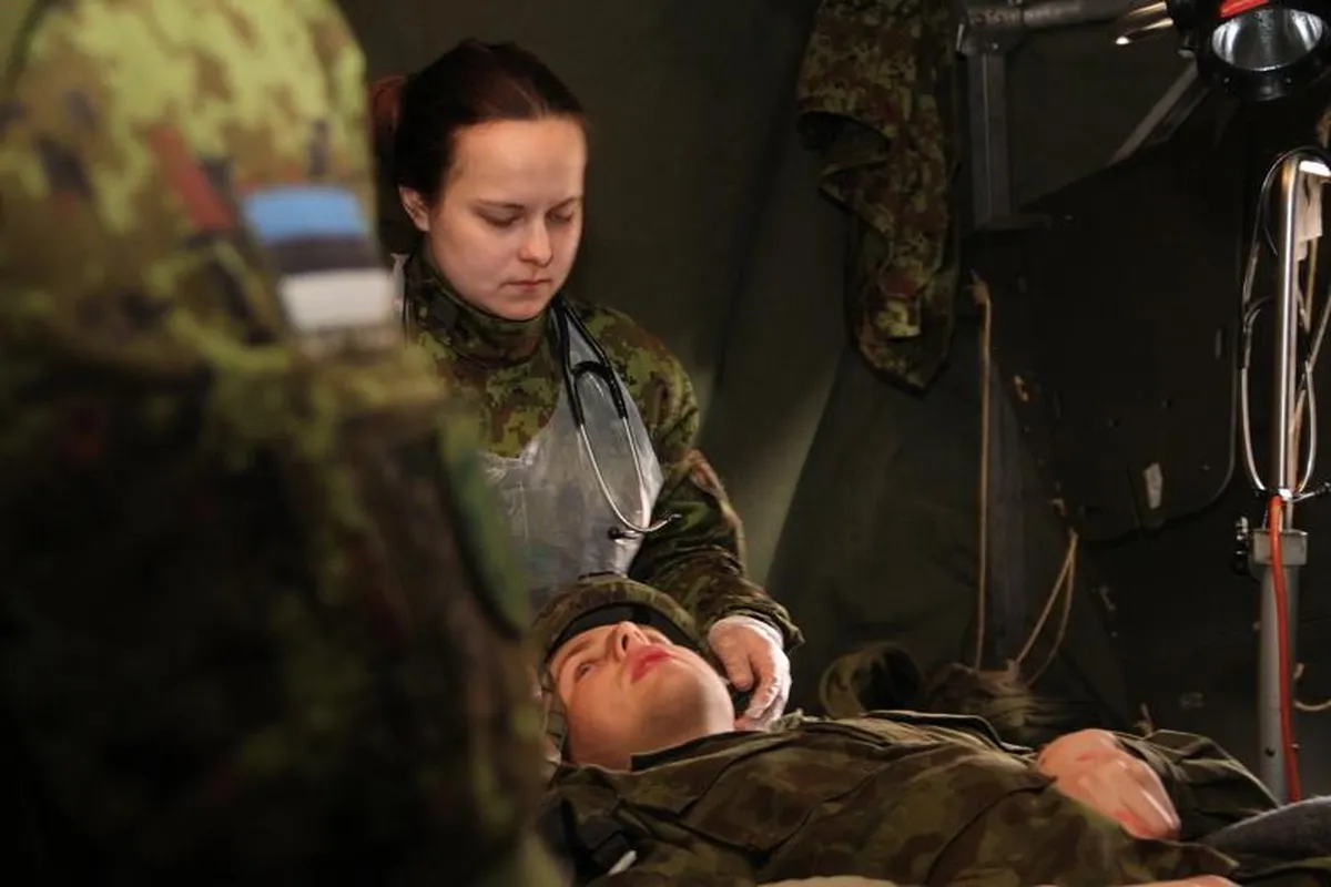 An Estonian Defense Forces paramedic during a tactical combat casualty care training exercise.