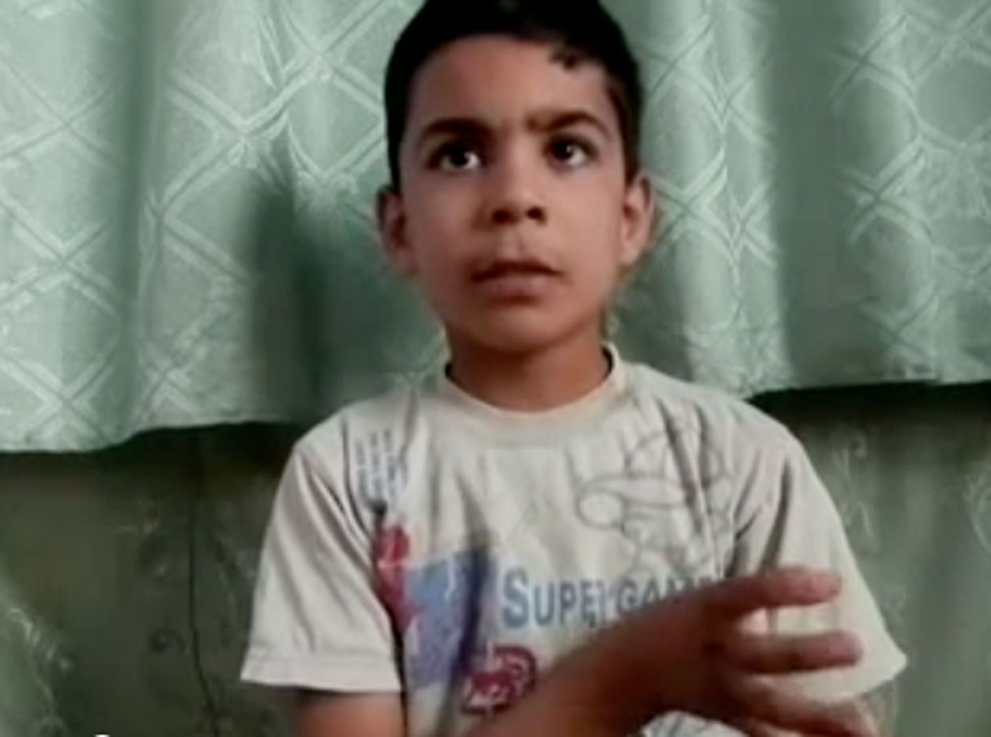 Houla veresaunast ellu jäänud 11-aastane Ali el-Sayed