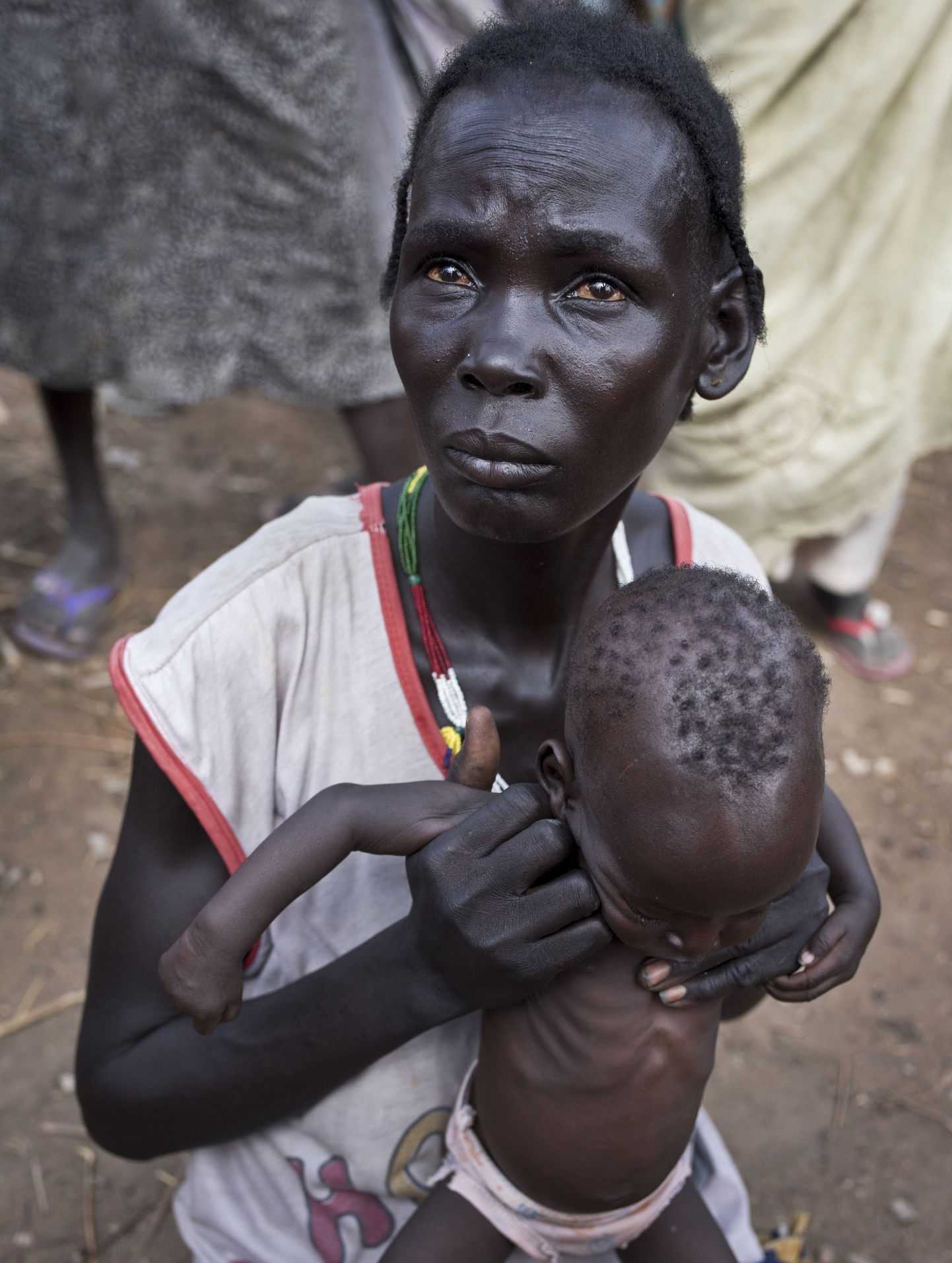 Lõuna-Sudaanis elav Abuk Garang oma seitsmekuuse pojaga.