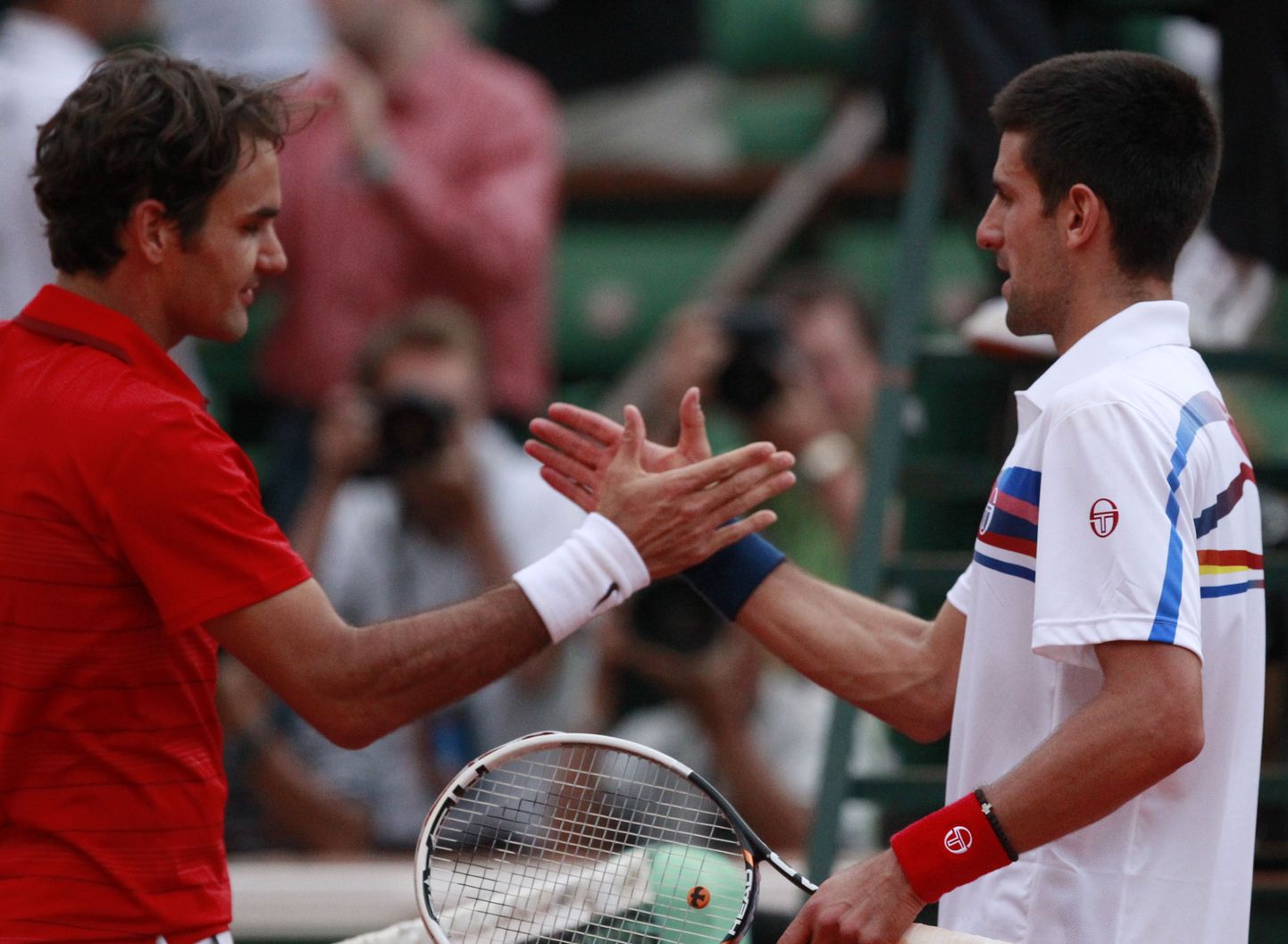 Roger Federer (vasakul) ja  Novak Djokovic.