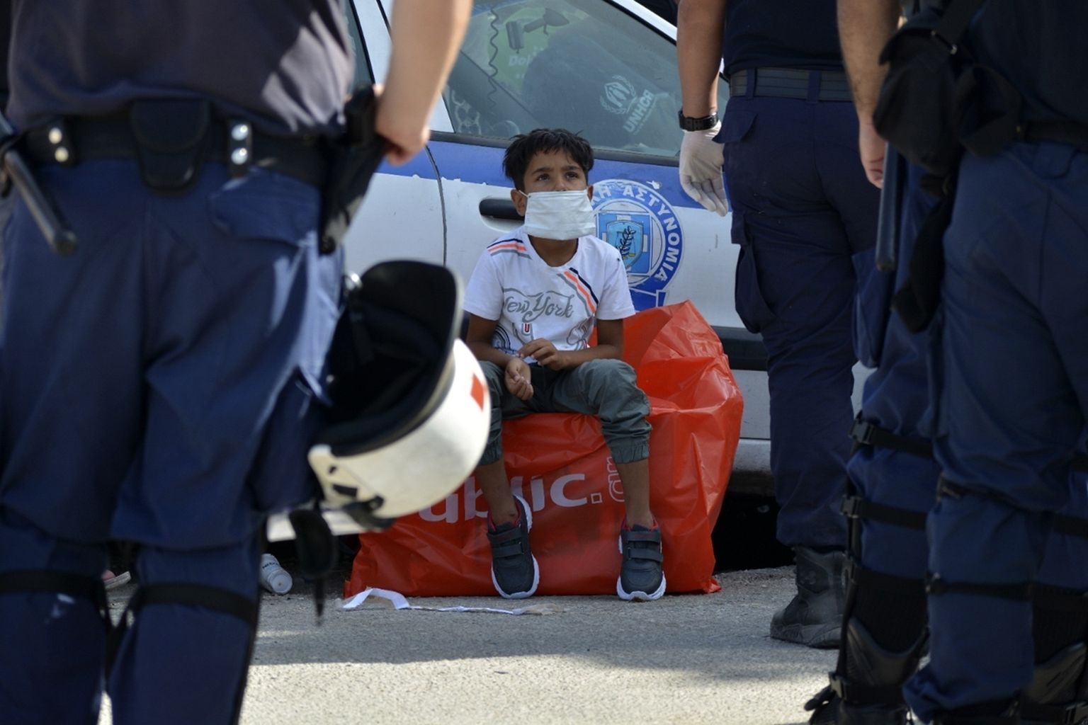 Мигранты в Греции.