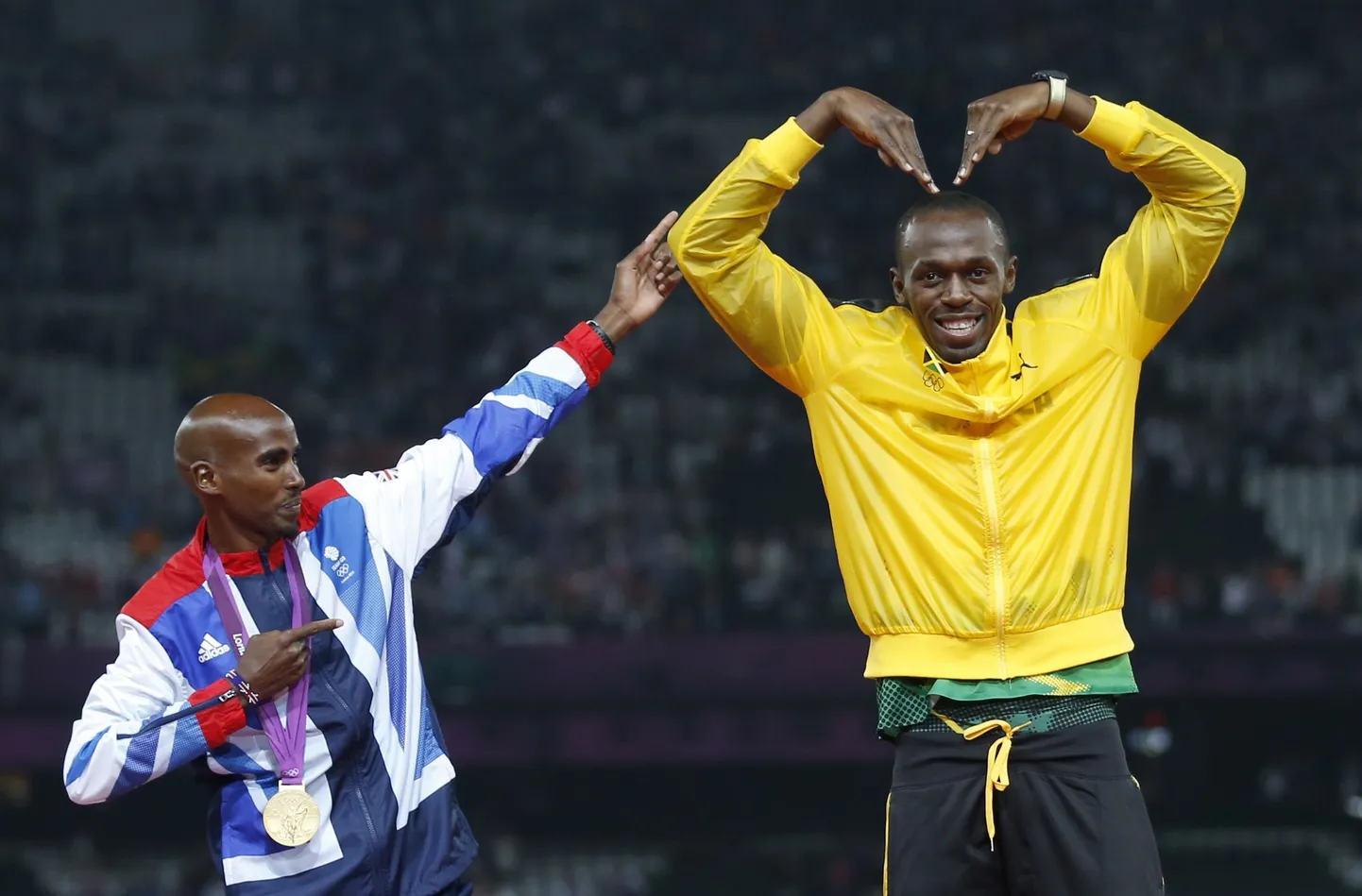Usain Bolt (paremal) ja Mo Farah