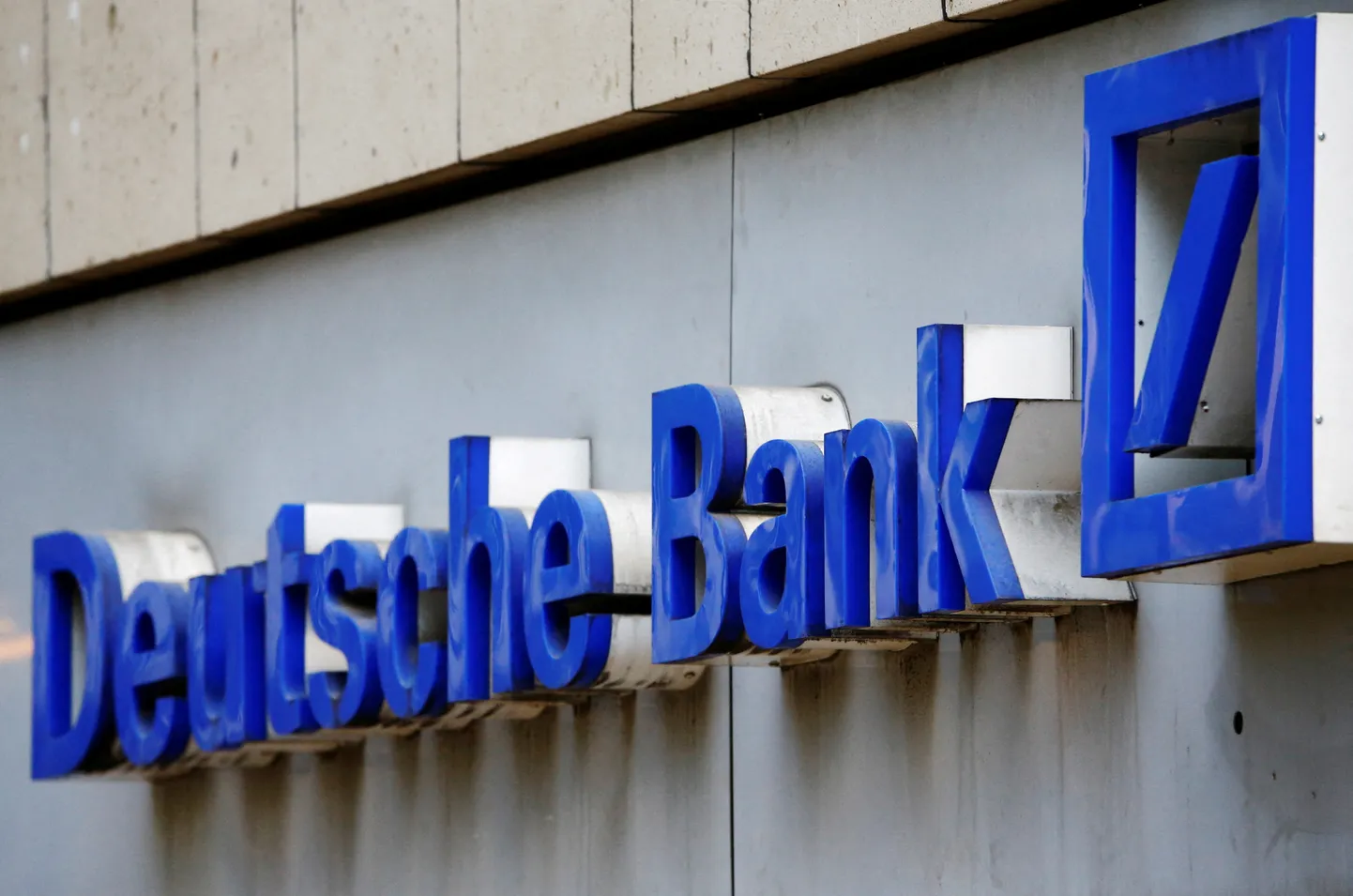 FILE PHOTO: A logo of a branch of Germany's Deutsche Bank is seen in Cologne, Germany, July 18, 2016.  REUTERS/Wolfgang Rattay/File Photo/File Photo