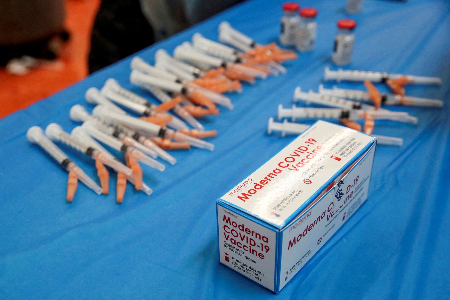 FILE PHOTO: The Moderna COVID-19 vaccine sits on the table at Trinity United Church of Christ in Chicago, Illinois, U.S., February 13, 2021.  REUTERS/Kamil Krzaczynski/File Photo