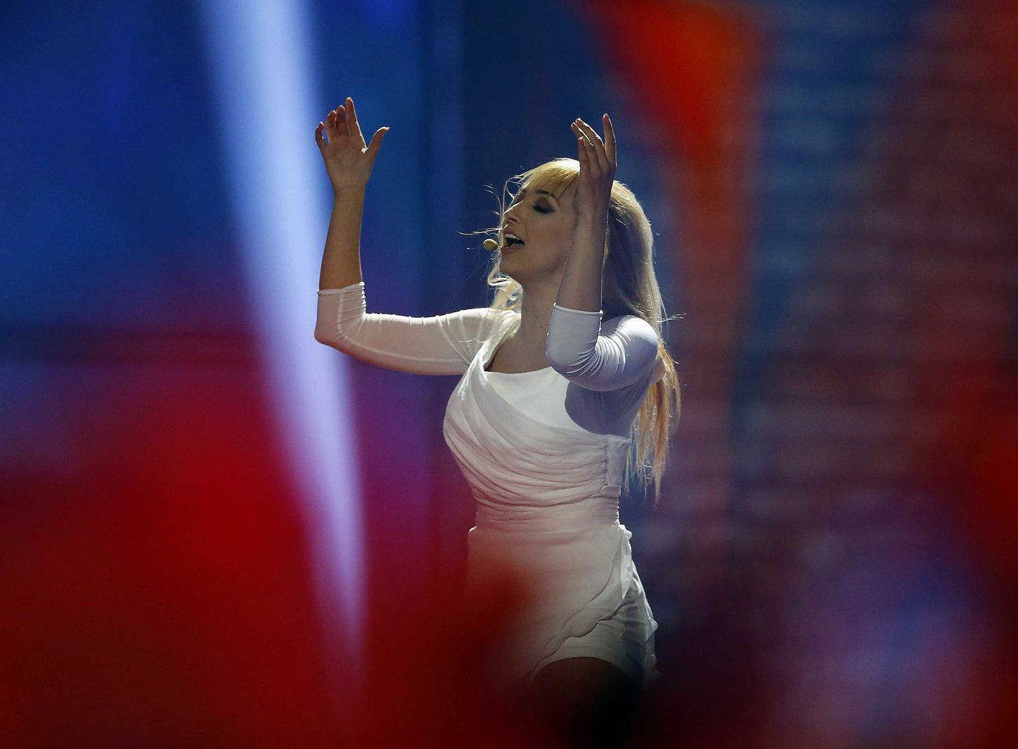 Singer Tanja representing Estonia performs the song 'Amazing',  during the first semifinal of the Eurovision Song Contest in the B&W Halls in Copenhagen, Denmark, Tuesday, May 6, 2014. (AP Photo/Frank Augstein) / TT / kod 436